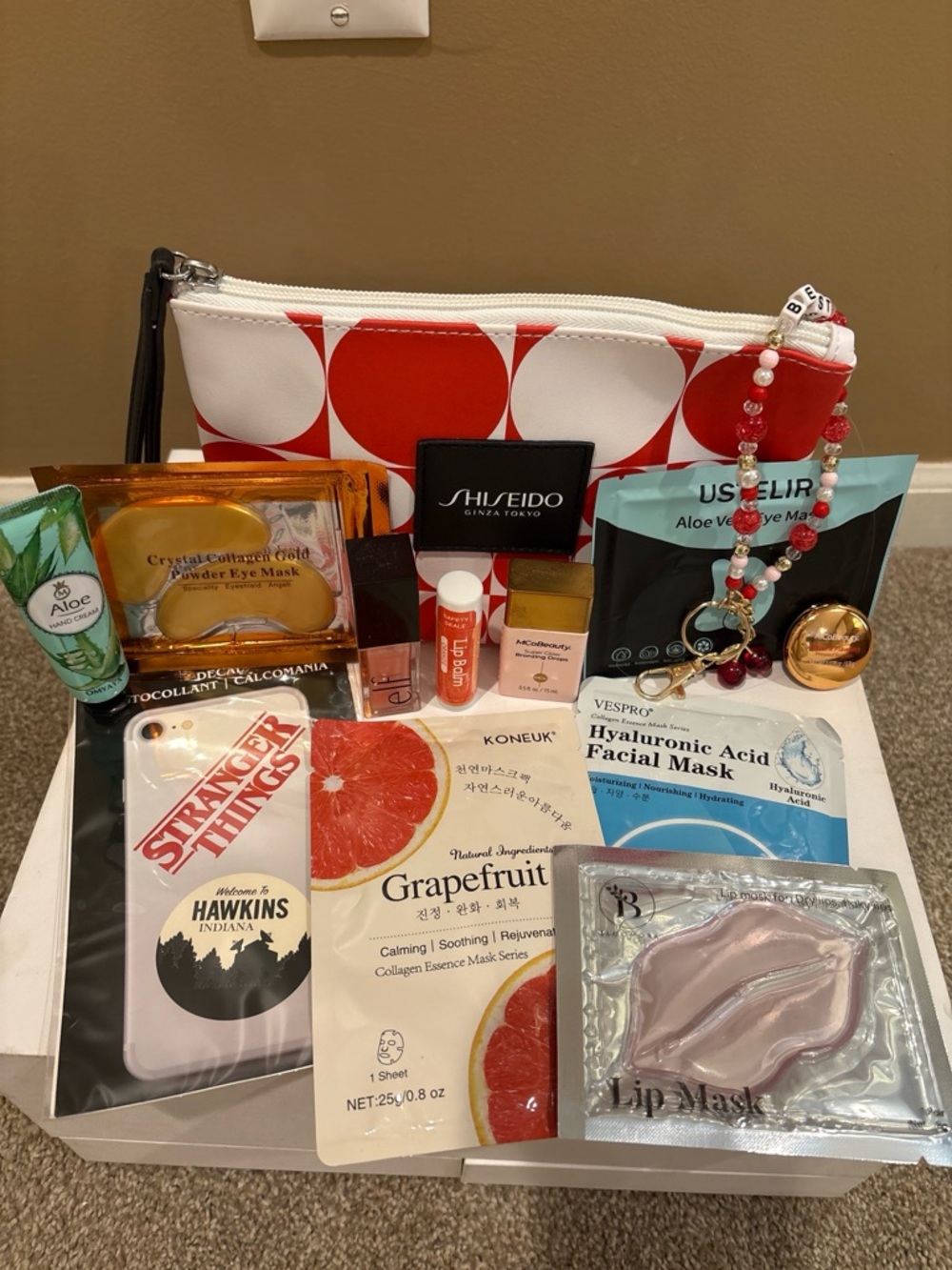 Shiseido Red and White Polka Dot Cosmetic Pouch with Skincare Essentials